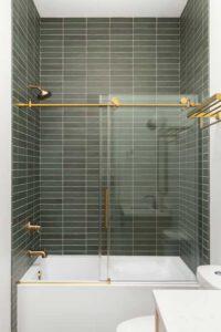 Dark green tiles in the shower