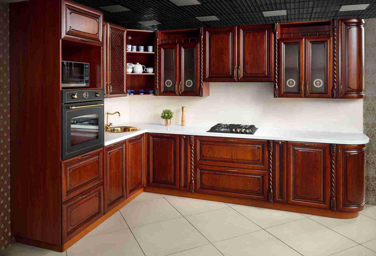 Cherry cabinets with white backsplash