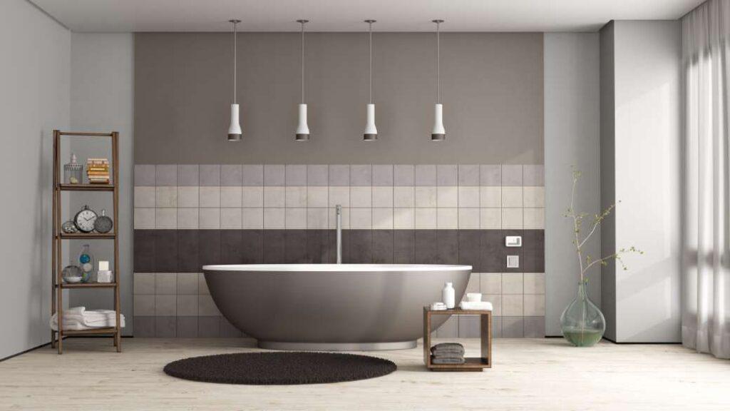 A bathroom with half tiled walls
