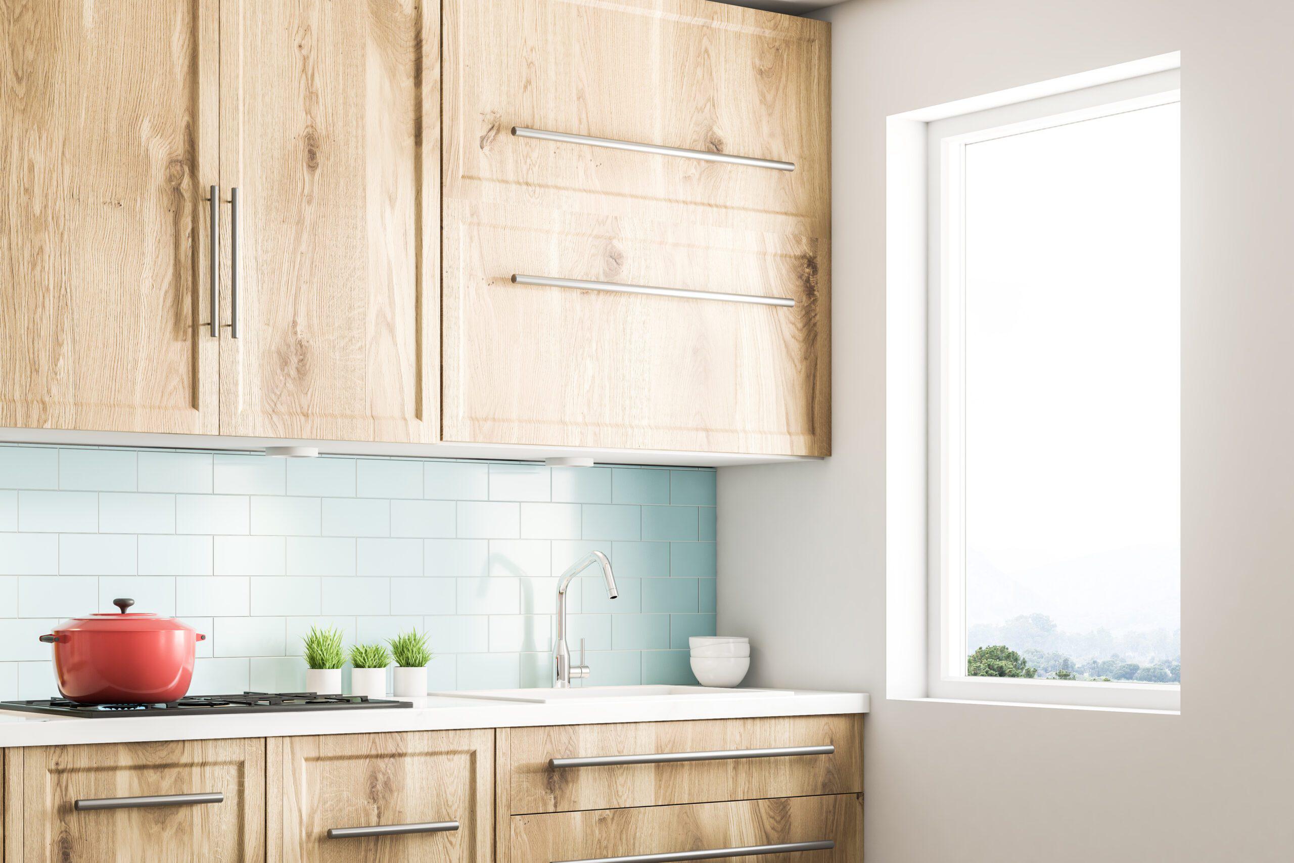 Contemporary kitchen with natural wood cabinets.