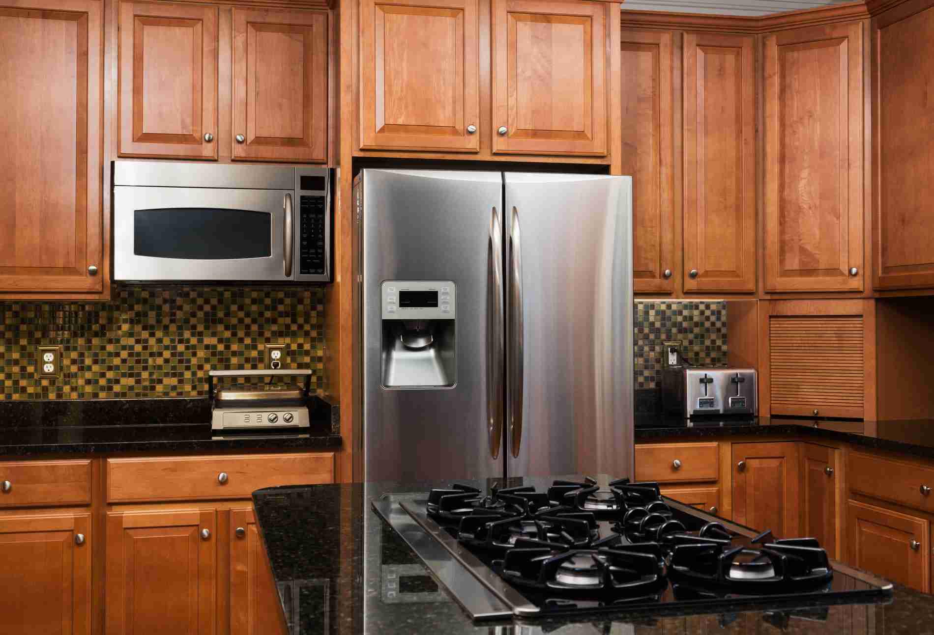 Modern kitchen with cherry cabinets