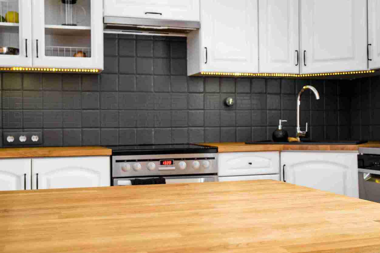 White cabinets for butcher block countertops and island