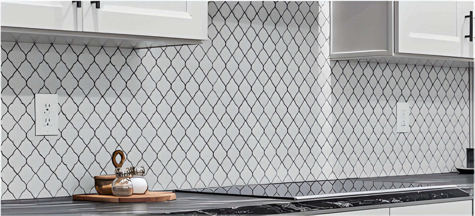 White backsplash tile in a repeating lantern pattern is the backsplash in a kitchen with white cabinetry