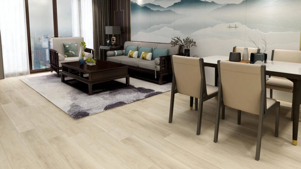 Renovated living and dining room with sleek luxury vinyl plank flooring in a light, blonde wood