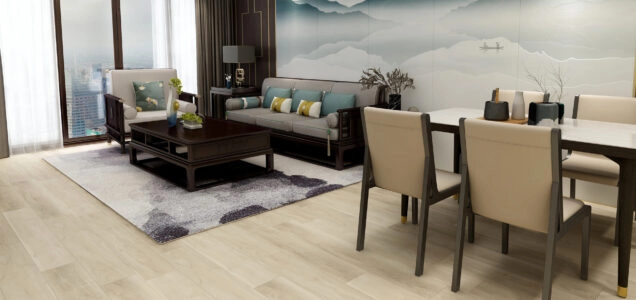 Renovated living and dining room with sleek luxury vinyl plank flooring in a light, blonde wood