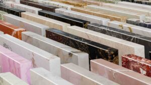 Examples of countertop samples in a showroom, lined up horizontally.