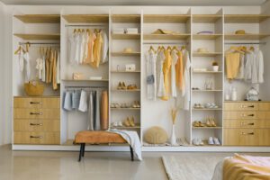 Organized wardrobe with various clothing and accessories 1