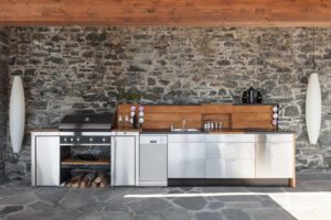 steel wood stone outdoor kitchen trend